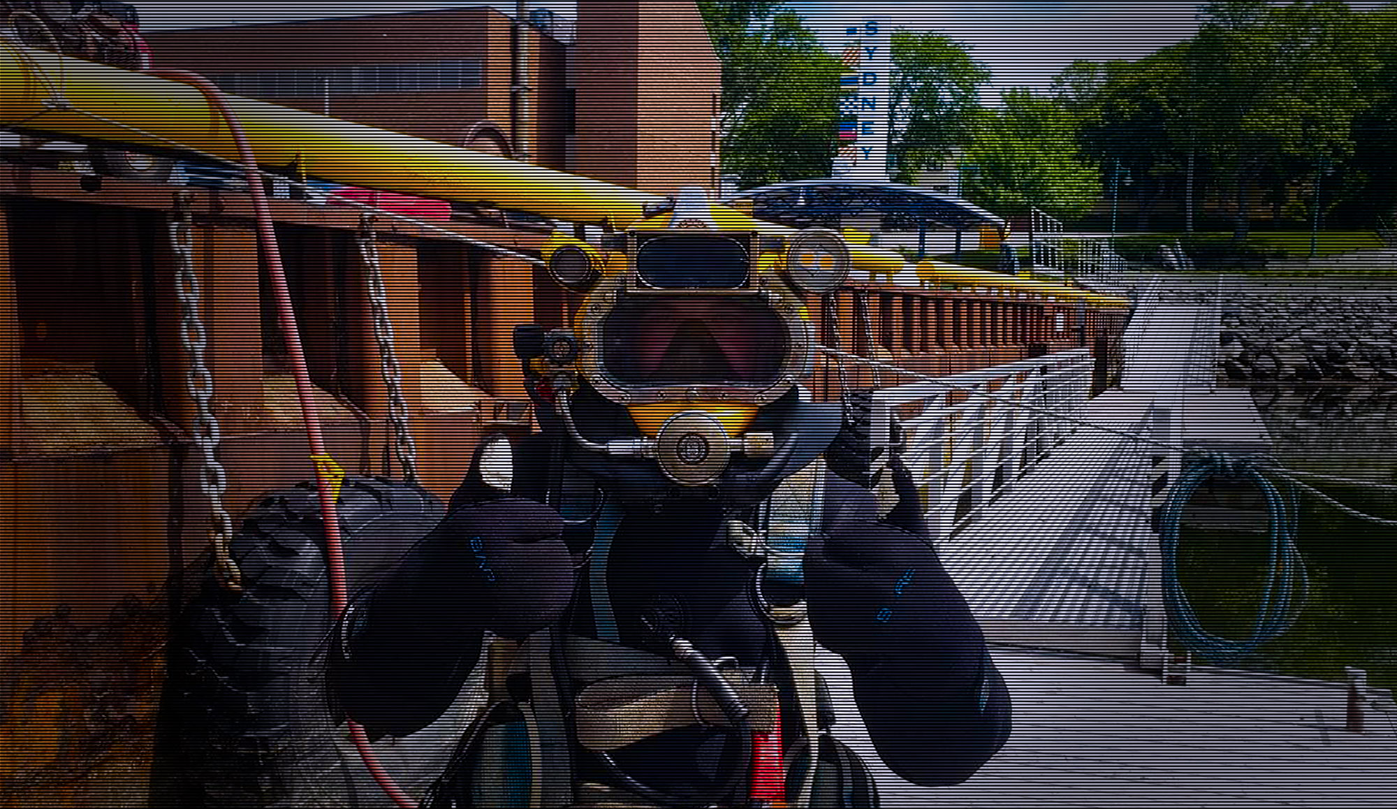 Image of CDMS diver ready to get in the water to perform various commercial diving and marine services.
